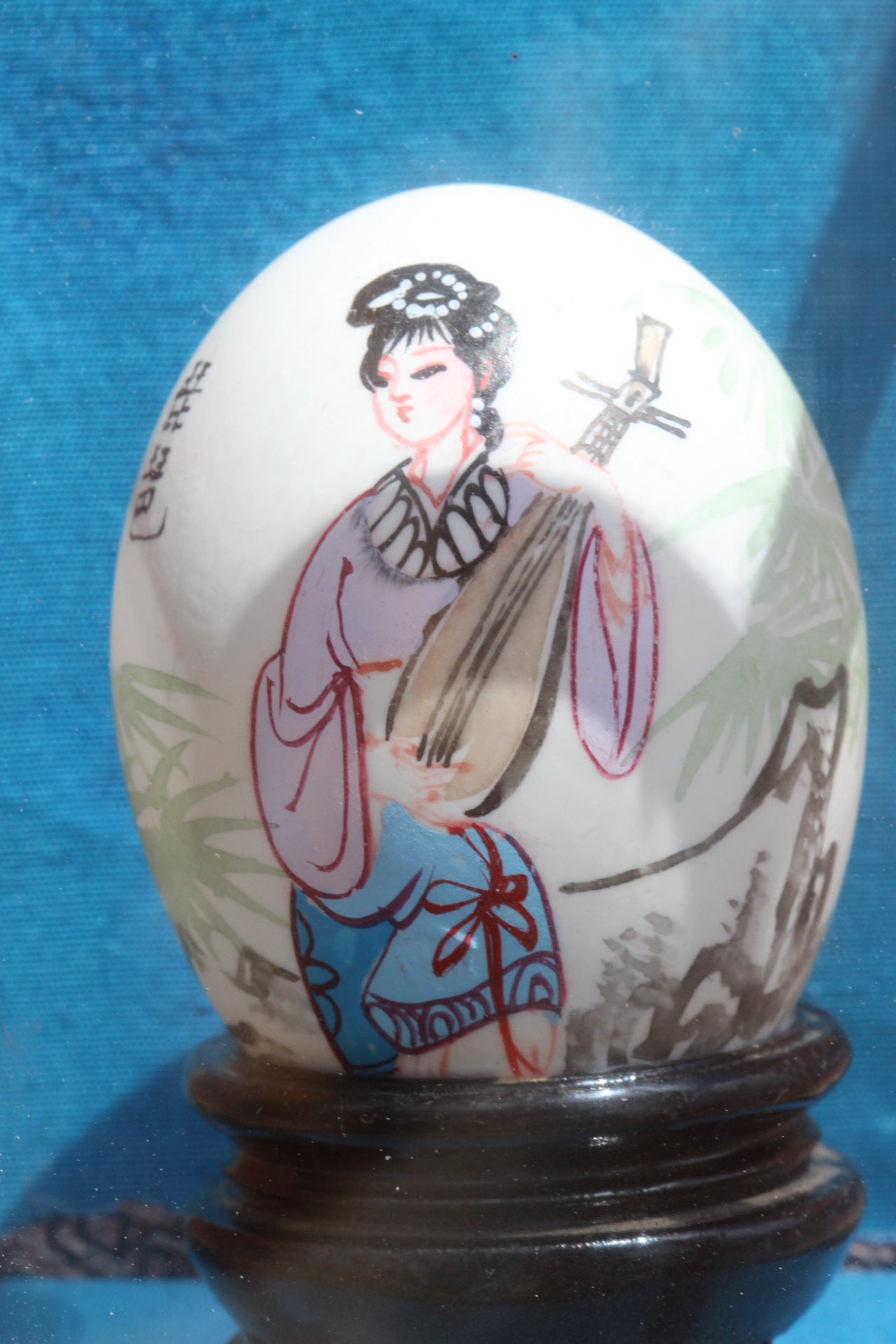Lady On The Egg In a Box On a Cross